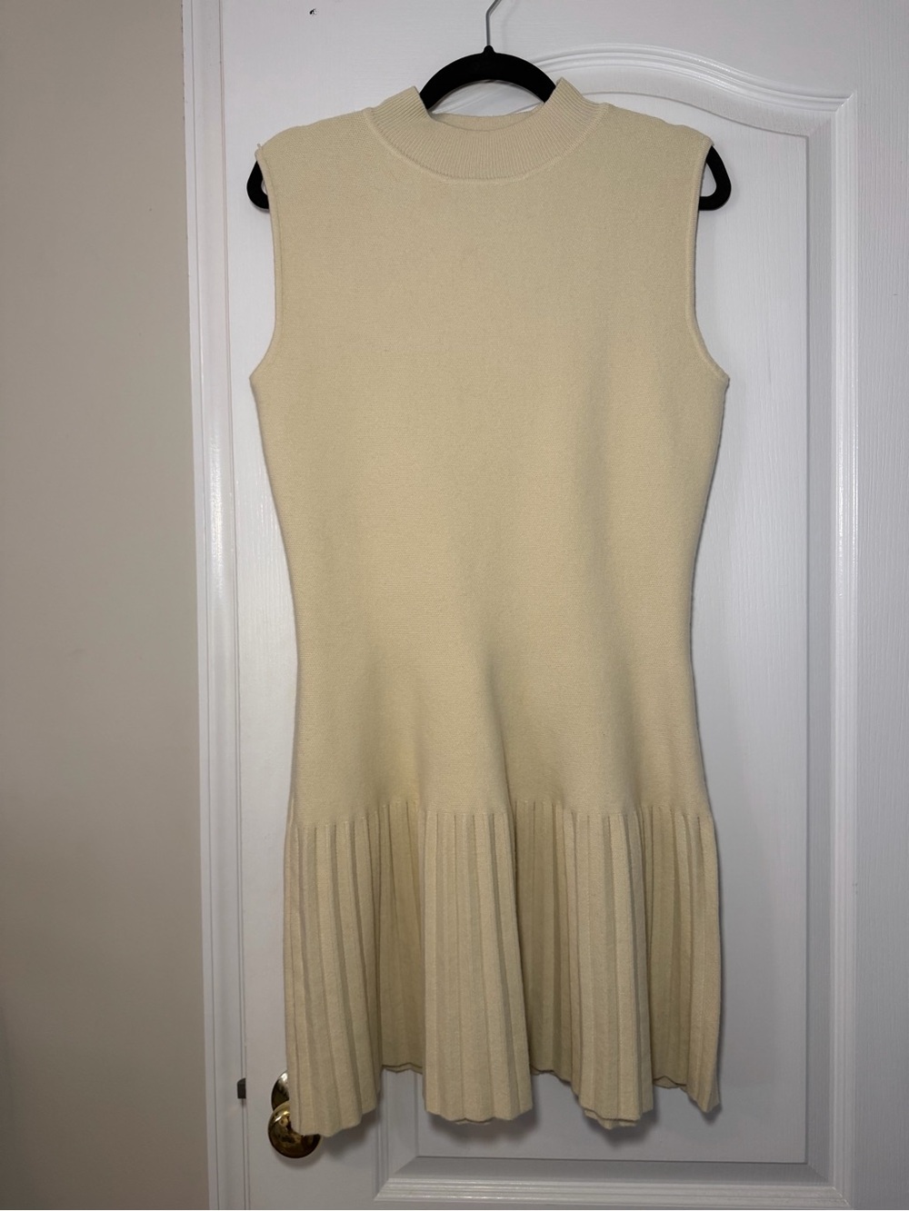 Lumiere Sleeveless Cream Knit Pleated-Hem Dress